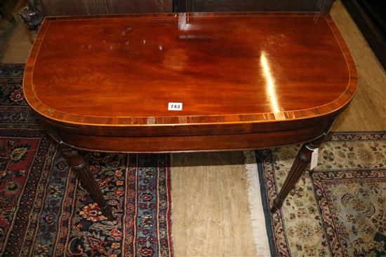 Regency mahogany D-shaped card table with folding top(-)